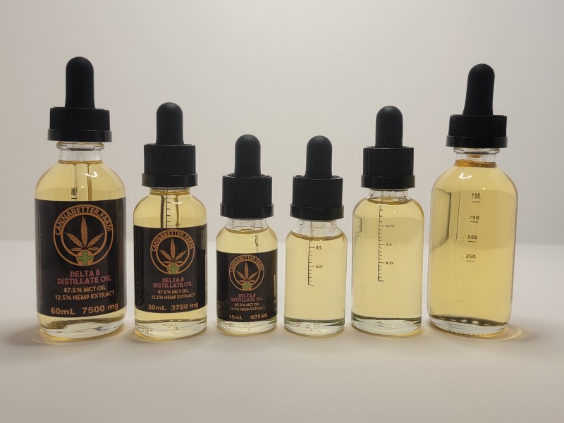 CannaBetter.Farm Ltd. Co all sizes of our Pure Delta-8 THC Hemp Extract Oil, 60ml, 30ml, and 15ml, shown with and without labels.